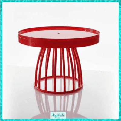 Mesa vermelha moderna com base de barras e tampo circular, ideal para decoração de interiores ou uso em espaços sociais.
